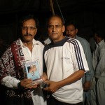 Khalid Ghullo presents shield to Riaz Ahmed for his media coordinator work in Dadu