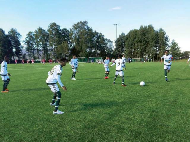 Street child team advances to Norway Cup knockouts [Express Tribune]