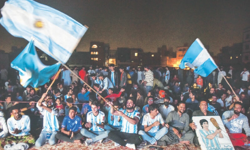 Clad in Argentina colours, fans in Malir celebrate football festival [Dawn]